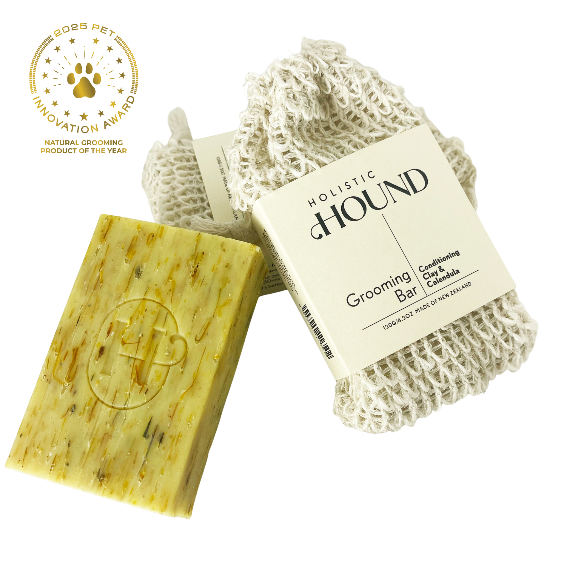 Holistic Hound grooming bar and loofah on a white background